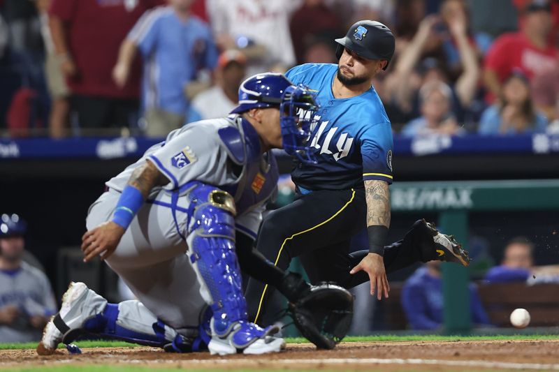 Sep 12, 2025; Philadelphia, Pennsylvania, USA; Philadelphia Phillies catcher Rafael Marchan (13) scores past Kansas City Royals catcher Salvador Perez (13) during the fourth inning at Citizens Bank Park. Mandatory Credit: Bill Streicher-Imagn Images
