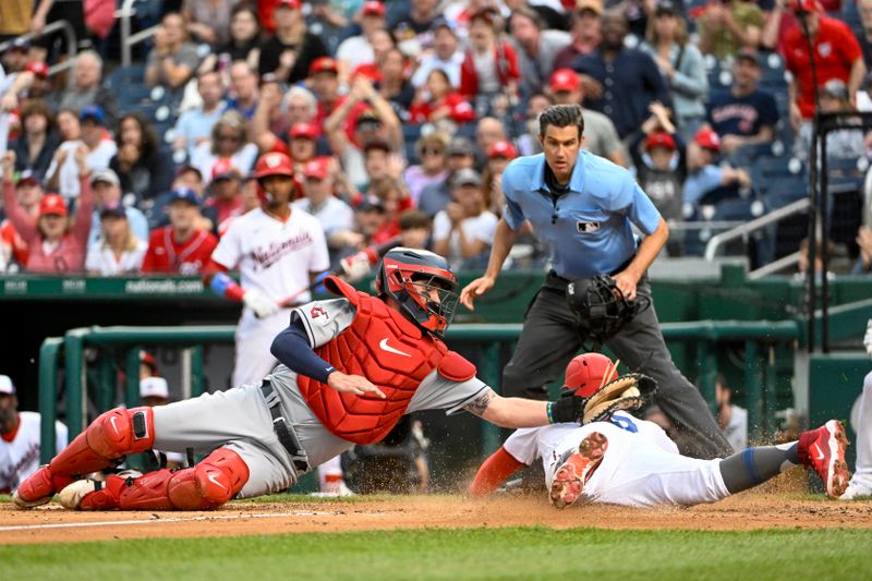 Apr 15, 2023; Washington, District of Columbia, USA; /Washington Nationals second baseman Luis Garcia (2) beat the tag attempt by Cleveland Guardians catcher Cam Gallagher (35) to score during the fourth inning at Nationals Park. Mandatory Credit: Brad Mills-USA TODAY Sports