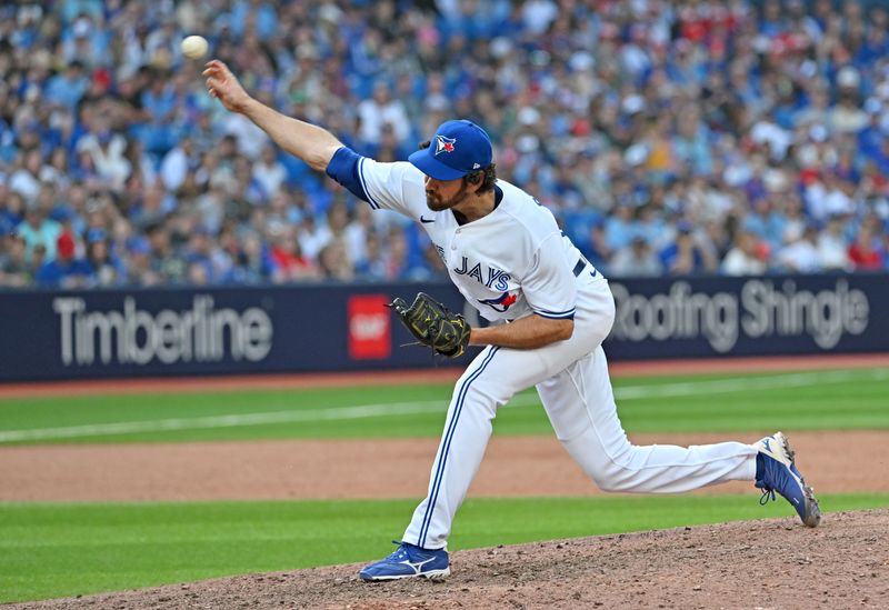 May 13, 2023; Toronto, Ontario, CAN; Toronto Blue Jays relief pitcher Jordan Romano (68) delivers a pitch against the Atlanta Braves in the ninth inning at Rogers Centre. Mandatory Credit: Dan Hamilton-USA TODAY Sports