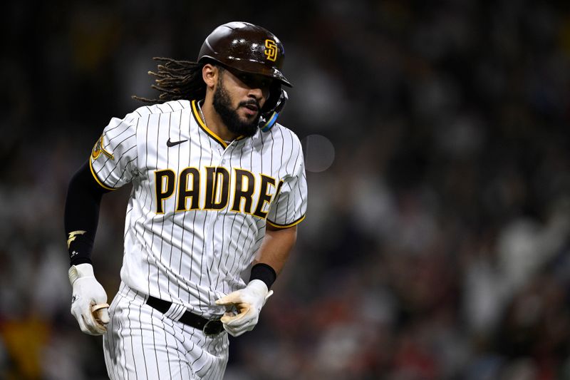 Sep 5, 2023; San Diego, California, USA; San Diego Padres right fielder Fernando Tatis Jr. (23) rounds the bases after hitting a home run against the Philadelphia Phillies during the fourth inning at Petco Park. Mandatory Credit: Orlando Ramirez-USA TODAY Sports