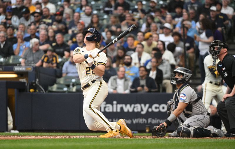 May 23, 2023; Milwaukee, Wisconsin, USA; Milwaukee Brewers right fielder Joey Wiemer (28) watches his home run go over the wall against the Houston Astros in the third inning at American Family Field. Mandatory Credit: Michael McLoone-USA TODAY Sports