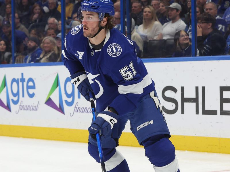 Nov 12, 2025; Tampa, Florida, USA; Tampa Bay Lightning defenseman Charle-Edouard D'Astous (51) skates with the puck against the New York Rangers during the second period at Benchmark International Arena. Mandatory Credit: Kim Klement Neitzel-Imagn Images