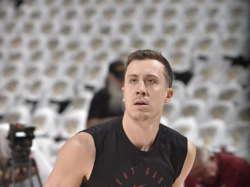 CLEVELAND, OH - APRIL 23: Duncan Robinson #55 of the Miami Heat warms up before Round One Game Two of the 2025 NBA Playoffs on April 23, 2025 at Rocket Mortgage FieldHouse in Cleveland, Ohio. NOTE TO USER: User expressly acknowledges and agrees that, by downloading and/or using this Photograph, user is consenting to the terms and conditions of the Getty Images License Agreement. Mandatory Copyright Notice: Copyright 2025 NBAE (Photo by David Liam Kyle/NBAE via Getty Images)