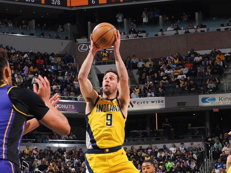 INDIANAPOLIS, IN - MARCH 29: T.J. McConnell #9 of the Indiana Pacers drives to the basket during the game against the Los Angeles Lakers on March 29, 2024 at Gainbridge Fieldhouse in Indianapolis, Indiana. NOTE TO USER: User expressly acknowledges and agrees that, by downloading and or using this Photograph, user is consenting to the terms and conditions of the Getty Images License Agreement. Mandatory Copyright Notice: Copyright 2024 NBAE (Photo by Ron Hoskins/NBAE via Getty Images)