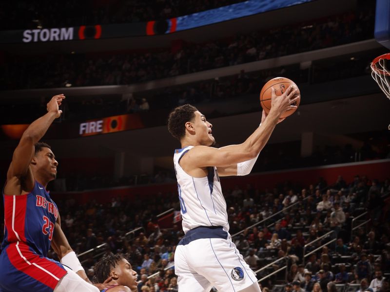 DETROIT, MI - MARCH 9: Josh Green #8 of the Dallas Mavericks drives to the basket during the game against the Detroit Pistons on March 9, 2024 at Little Caesars Arena in Detroit, Michigan. NOTE TO USER: User expressly acknowledges and agrees that, by downloading and/or using this photograph, User is consenting to the terms and conditions of the Getty Images License Agreement. Mandatory Copyright Notice: Copyright 2024 NBAE (Photo by Brian Sevald/NBAE via Getty Images)