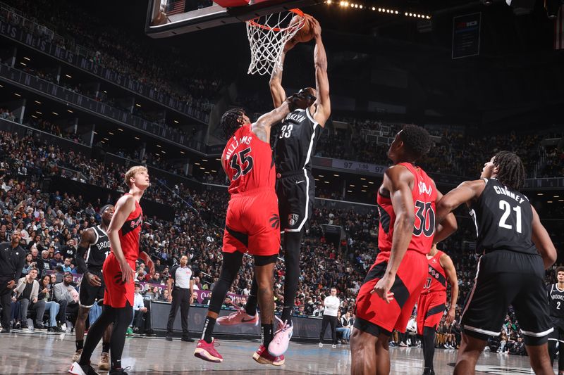 BROOKLYN, NY - APRIL 10: Nicolas Claxton #33 of the Brooklyn Nets goes to the basket during the game on April 10, 2024 at Barclays Center in Brooklyn, New York. NOTE TO USER: User expressly acknowledges and agrees that, by downloading and or using this Photograph, user is consenting to the terms and conditions of the Getty Images License Agreement. Mandatory Copyright Notice: Copyright 2024 NBAE (Photo by Nathaniel S. Butler/NBAE via Getty Images)