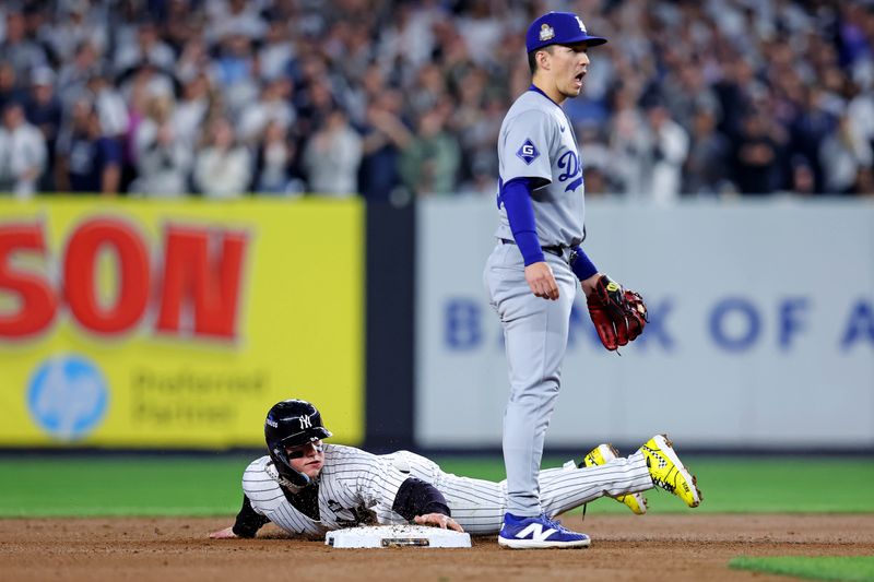 Oct 30, 2024; New York, New York, USA; New York Yankees outfielder Alex Verdugo (24) steals second base during the second inning against the Los Angeles Dodgers in game four of the 2024 MLB World Series at Yankee Stadium. Mandatory Credit: Brad Penner-Imagn Images