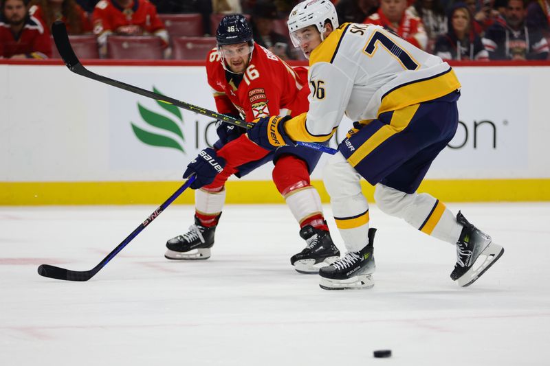 Nov 7, 2024; Sunrise, Florida, USA; Florida Panthers center Aleksander Barkov (16) passes the puck for an assist as Nashville Predators defenseman Brady Skjei (76) defends during the second period at Amerant Bank Arena. Mandatory Credit: Sam Navarro-Imagn Images