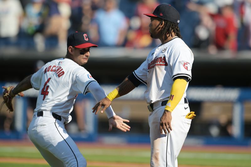 Sep 15, 2024; Cleveland, Ohio, USA; Cleveland Guardians shortstop Brayan Rocchio (4) and designated hitter Jose Ramirez (11) celebrate after the Guardians beat the Tampa Bay Rays at Progressive Field. Mandatory Credit: Ken Blaze-Imagn Images