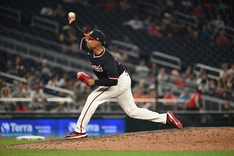 Aug 5, 2024; Washington, District of Columbia, USA; Washington Nationals relief pitcher Eduardo Salazar throws a pitch against the San Francisco Giants during the eighth inning at Nationals Park. Mandatory Credit: Rafael Suanes-USA TODAY Sports