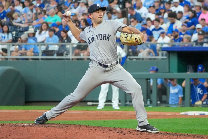 Jun 12, 2024; Kansas City, Missouri, USA; New York Yankees starting pitcher Cody Poteet (72) delivers a pitch against the Kansas City Royals in the fourth inning at Kauffman Stadium. Mandatory Credit: Denny Medley-USA TODAY Sports