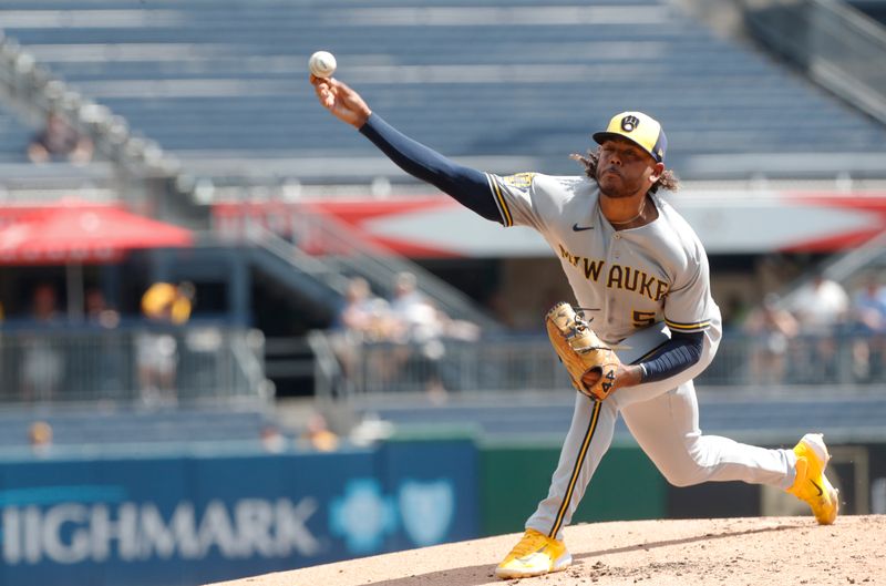 Sep 6, 2023; Pittsburgh, Pennsylvania, USA;  Milwaukee Brewers starting pitcher Freddy Peralta (51) delivers a pitch against the Pittsburgh Pirates during the first inning at PNC Park. Mandatory Credit: Charles LeClaire-USA TODAY Sports