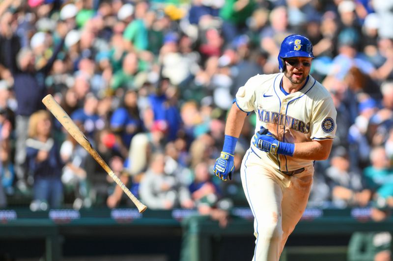 Sep 29, 2024; Seattle, Washington, USA; Seattle Mariners catcher Cal Raleigh (29) celebrates after hitting a 2-run home run against the Oakland Athletics during the fifth inning at T-Mobile Park. Mandatory Credit: Steven Bisig-Imagn Images