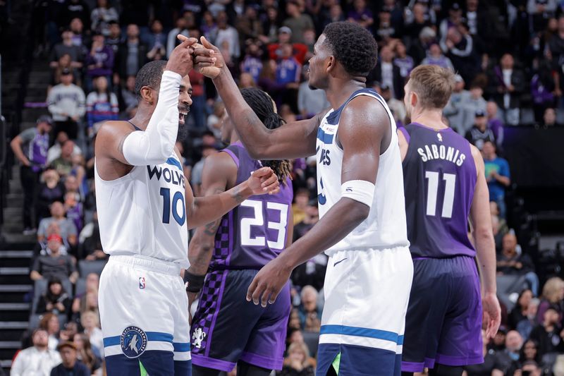 SACRAMENTO, CA - NOVEMBER 15: Anthony Edwards #5 and Mike Conley #10 of the Minnesota Timberwolves celebrates during the game against the Sacramento Kings during the Emirates NBA Cup game on November 15, 2024 at Golden 1 Center in Sacramento, California. NOTE TO USER: User expressly acknowledges and agrees that, by downloading and or using this Photograph, user is consenting to the terms and conditions of the Getty Images License Agreement. Mandatory Copyright Notice: Copyright 2024 NBAE (Photo by Rocky Widner/NBAE via Getty Images)