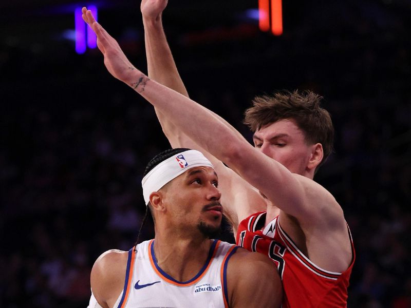 NEW YORK, NEW YORK - NOVEMBER 13: Josh Hart #3 of the New York Knicks drives to the basket against Matas Buzelis #14 of the Chicago Bulls during the second quarter at Madison Square Garden on November 13, 2024 in New York City. NOTE TO USER: User expressly acknowledges and agrees that, by downloading and or using this photograph, User is consenting to the terms and conditions of the Getty Images License Agreement. (Photo by Elsa/Getty Images)