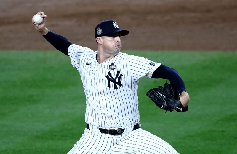 Oct 30, 2024; New York, New York, USA; New York Yankees pitcher Clay Holmes (35) throws during the seventh inning against the Los Angeles Dodgers in game five of the 2024 MLB World Series at Yankee Stadium. Mandatory Credit: Wendell Cruz-Imagn Images