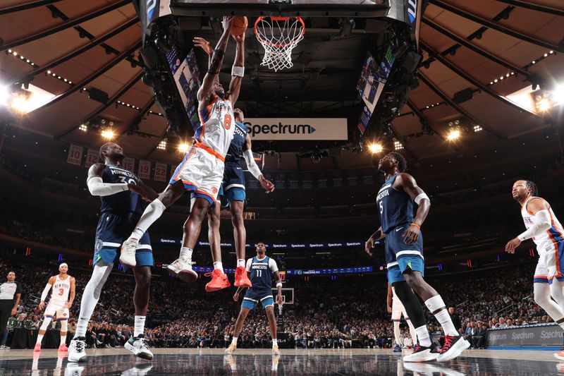 NEW YORK, NY - JANUARY 17: OG Anunoby #8 of the New York Knicks dunks the ball during the game against the Minnesota Timberwolves on January 17, 2025 at Madison Square Garden in New York City, New York.  NOTE TO USER: User expressly acknowledges and agrees that, by downloading and or using this photograph, User is consenting to the terms and conditions of the Getty Images License Agreement. Mandatory Copyright Notice: Copyright 2025 NBAE  (Photo by Nathaniel S. Butler/NBAE via Getty Images)