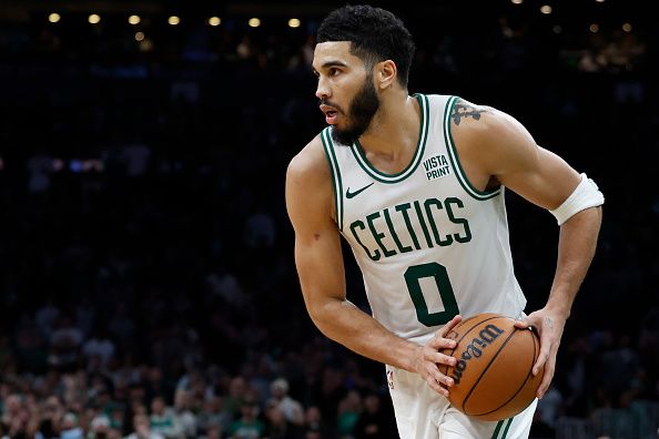 Boston, MA - December 28: Boston Celtics SF Jayson Tatum controls the ball. The Celtics beat the Detroit Pistons, 128-122, in overtime. (Photo by Danielle Parhizkaran/The Boston Globe via Getty Images)