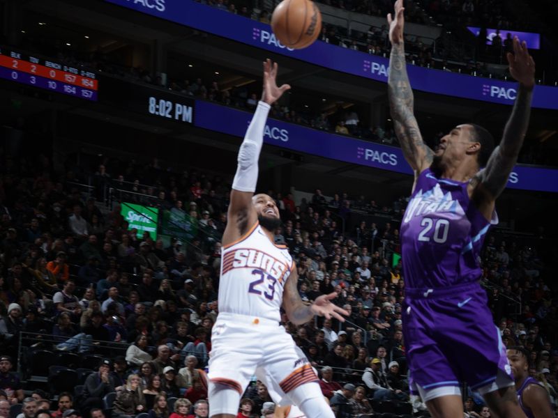 SALT LAKE CITY, UT - DECEMBER 13:   Monte Morris #23 of the Phoenix Suns shoots the ball during the game against the Utah Jazz during a regular season game on December 13, 2024 at Delta Center in Salt Lake City, Utah. NOTE TO USER: User expressly acknowledges and agrees that, by downloading and or using this Photograph, User is consenting to the terms and conditions of the Getty Images License Agreement. Mandatory Copyright Notice: Copyright 2024 NBAE (Photo by Melissa Majchrzak/NBAE via Getty Images)