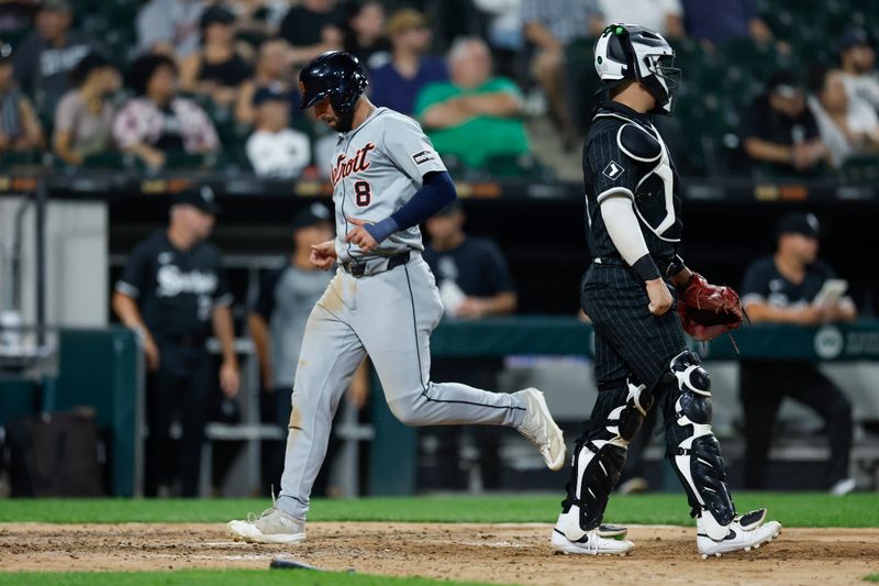 Aug 26, 2024; Chicago, Illinois, USA; Detroit Tigers outfielder Matt Vierling (8) scores against the Chicago White Sox during the seventh inning at Guaranteed Rate Field. Mandatory Credit: Kamil Krzaczynski-USA TODAY Sports