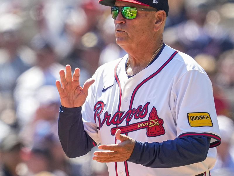 Apr 7, 2024; Cumberland, Georgia, USA; Atlanta Braves manager Brian Snitker (43) walks on the field to change pitchers against the Arizona Diamondbacks during the sixth inning at Truist Park. Mandatory Credit: Dale Zanine-USA TODAY Sports