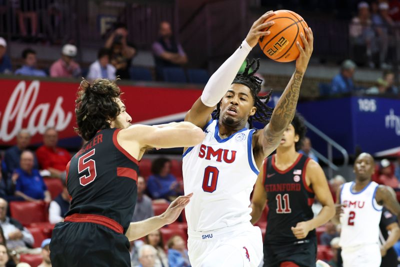 Feb 1, 2025; Dallas, Texas, USA;  Southern Methodist Mustangs guard B.J. Edwards (0) drives to the basket as Stanford Cardinal guard Benny Gealer (5) defends during the first half at Moody Coliseum. Mandatory Credit: Kevin Jairaj-Imagn Images