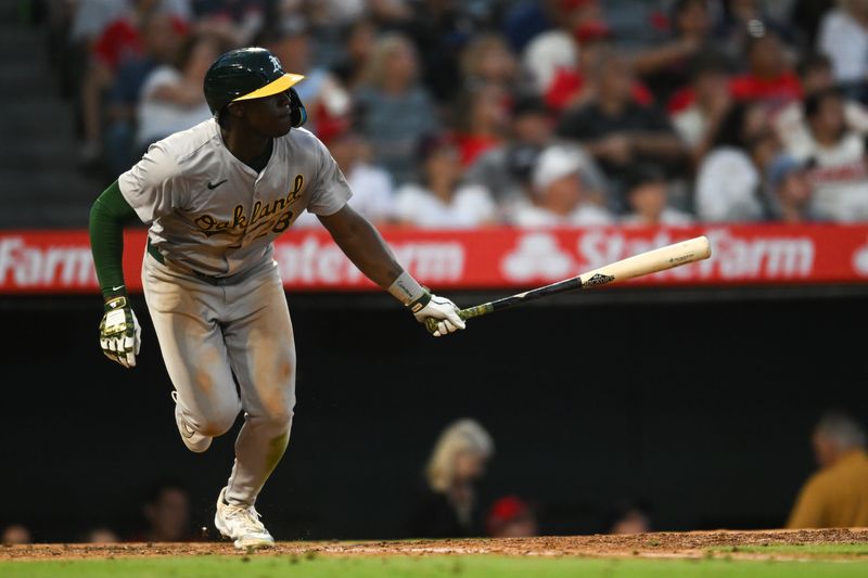 Jul 27, 2024; Anaheim, California, USA; Oakland Athletics outfielder Daz Cameron (28) flies out against the Los Angeles Angels during the sixth inning at Angel Stadium. Mandatory Credit: Jonathan Hui-USA TODAY Sports