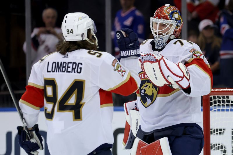 May 22, 2024; New York, New York, USA; Florida Panthers goaltender Sergei Bobrovsky (72) celebrates with left wing Ryan Lomberg (94) after defeating the New York Rangers in game one of the Eastern Conference Final of the 2024 Stanley Cup Playoffs at Madison Square Garden. Mandatory Credit: Brad Penner-USA TODAY Sports