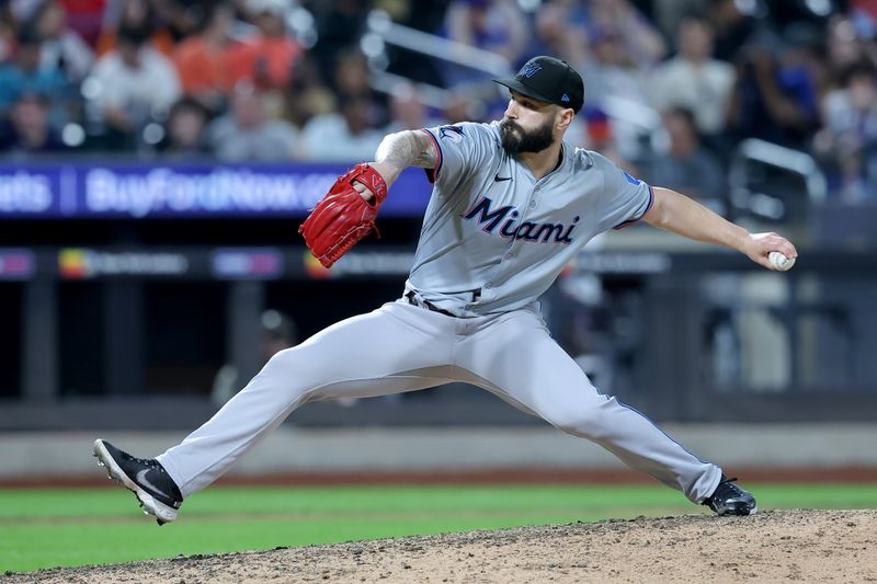 Jun 13, 2024; New York City, New York, USA; Miami Marlins relief pitcher Tanner Scott (66) pitches against the New York Mets during the ninth inning at Citi Field. Mandatory Credit: Brad Penner-USA TODAY Sports