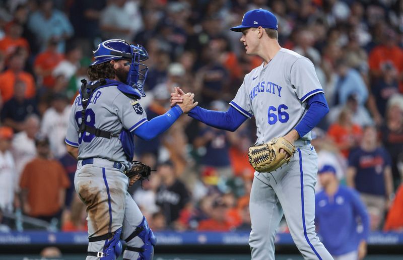 Sep 24, 2023; Houston, Texas, USA; Kansas City Royals relief pitcher James McArthur (66) and catcher Logan Porter (88) celebrate after the final out against the Houston Astros at Minute Maid Park. Mandatory Credit: Troy Taormina-USA TODAY Sports