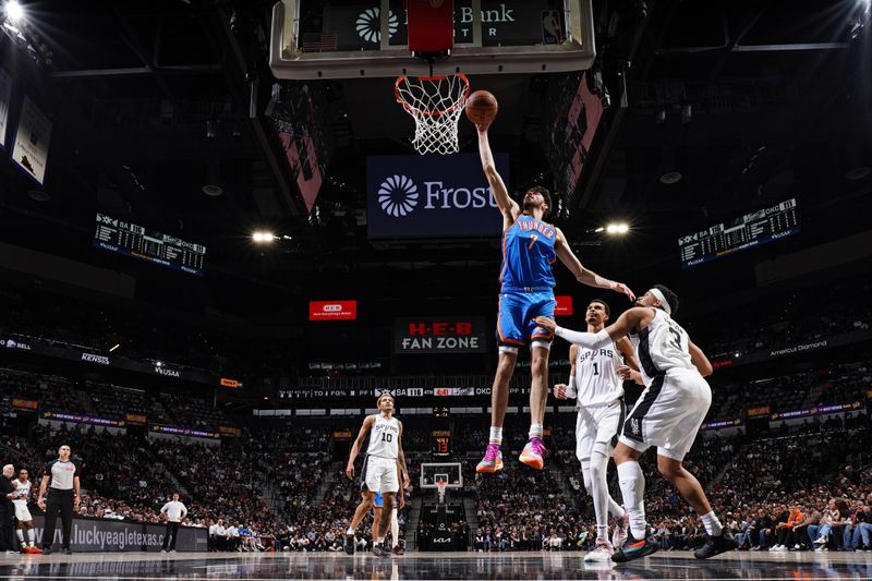 SAN ANTONIO, TX - FEBRUARY 29: Chet Holmgren #7 of the Oklahoma City Thunder drives to the basket during the game against the San Antonio Spurs on February 29, 2024 at the Frost Bank Center in San Antonio, Texas. NOTE TO USER: User expressly acknowledges and agrees that, by downloading and or using this photograph, user is consenting to the terms and conditions of the Getty Images License Agreement. Mandatory Copyright Notice: Copyright 2024 NBAE (Photos by Darren Carroll/NBAE via Getty Images)