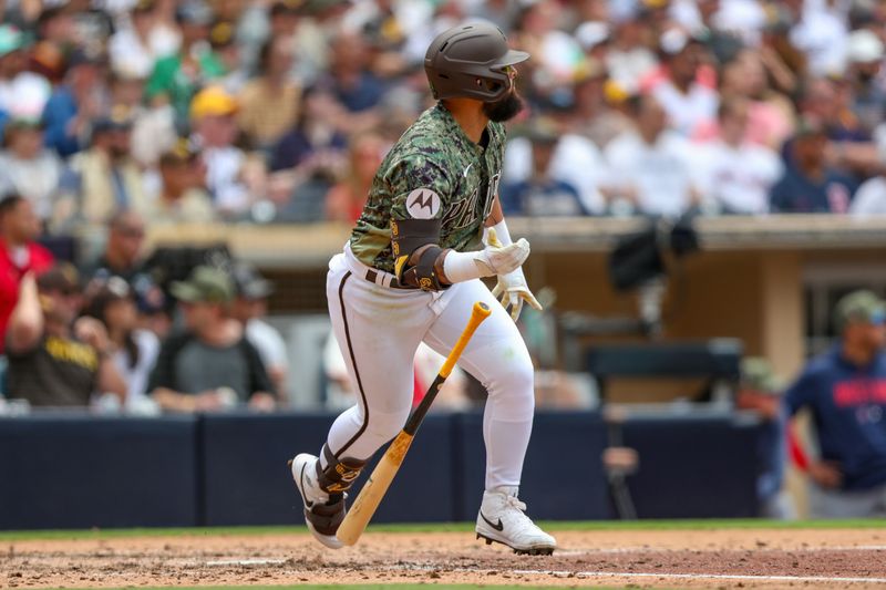 May 21, 2023; San Diego, California, USA;  San Diego Padres second baseman Rougned Odor (24) hits his second rbi double of the game in the sixth inning against the Boston Red Sox at Petco Park. Mandatory Credit: David Frerker-USA TODAY Sports