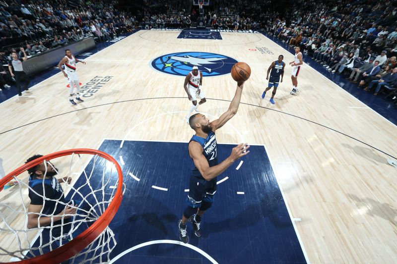 MINNEAPOLIS, MN -  MARCH 4: Rudy Gobert #27 of the Minnesota Timberwolves grabs a rebound during the game against the Portland Trail Blazers on March 4, 2024 at Target Center in Minneapolis, Minnesota. NOTE TO USER: User expressly acknowledges and agrees that, by downloading and or using this Photograph, user is consenting to the terms and conditions of the Getty Images License Agreement. Mandatory Copyright Notice: Copyright 2024 NBAE (Photo by David Sherman/NBAE via Getty Images)