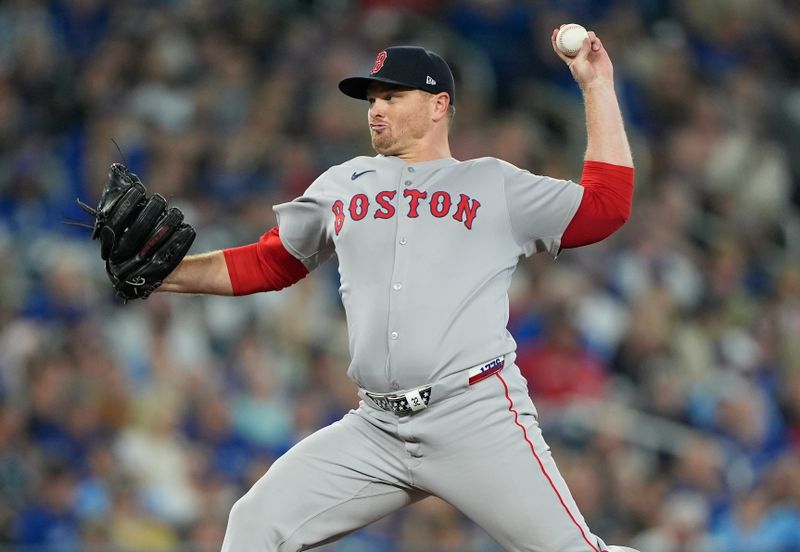 Sep 25, 2025; Toronto, Ontario, CAN; Boston Red Sox pitcher Justin Wilson (32) pitches to Toronto Blue Jays center fielder Daulton Varsho (not pictured) during the sixth inning at Rogers Centre. Mandatory Credit: John E. Sokolowski-Imagn Images