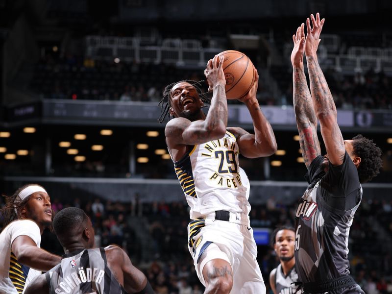 BROOKLYN, NY - DECEMBER 4: Quenton Jackson #29 of the Indiana Pacers drives to the basket during the game against the Brooklyn Nets on December 4, 2024 at Barclays Center in Brooklyn, New York. NOTE TO USER: User expressly acknowledges and agrees that, by downloading and or using this Photograph, user is consenting to the terms and conditions of the Getty Images License Agreement. Mandatory Copyright Notice: Copyright 2024 NBAE (Photo by Jeff Haynes/NBAE via Getty Images)