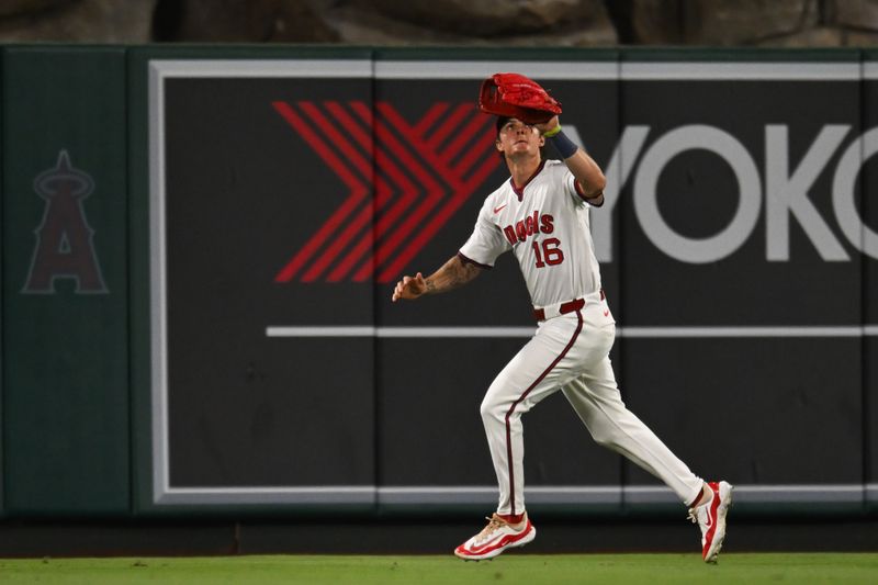 Jul 27, 2024; Anaheim, California, USA; Los Angeles Angels first baseman Nolan Schanuel (18) makes a catch against the Oakland Athletics during the eighth inning at Angel Stadium. Mandatory Credit: Jonathan Hui-USA TODAY Sports