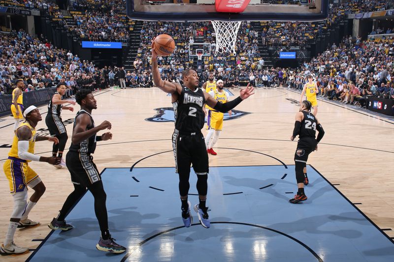 MEMPHIS, TN - APRIL 19: Xavier Tillman #2 of the Memphis Grizzlies rebounds the ball during Round One Game Two of the 2023 NBA Playoffs against the Los Angeles Lakers on April 19, 2023 at FedExForum in Memphis, Tennessee. NOTE TO USER: User expressly acknowledges and agrees that, by downloading and or using this photograph, User is consenting to the terms and conditions of the Getty Images License Agreement. Mandatory Copyright Notice: Copyright 2023 NBAE (Photo by Joe Murphy/NBAE via Getty Images)