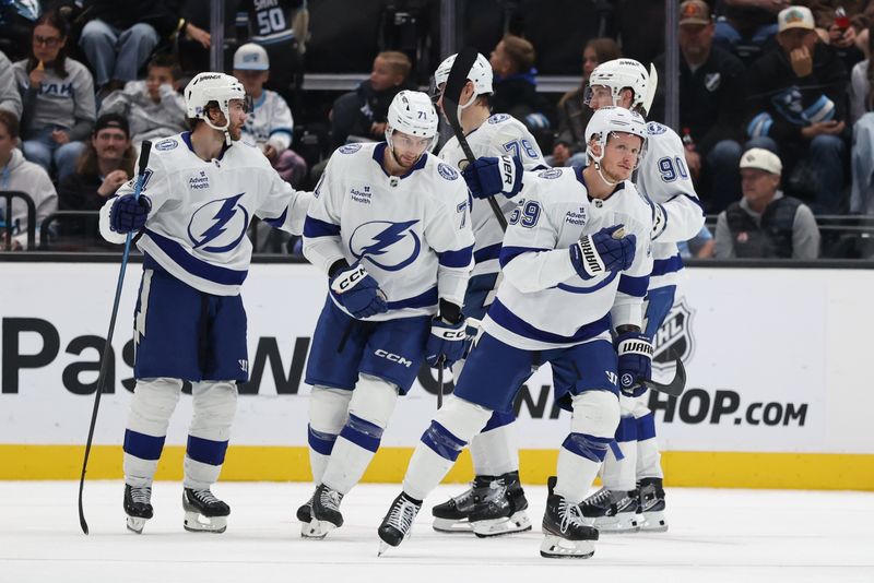 Nov 2, 2025; Salt Lake City, Utah, USA; Tampa Bay Lightning center Jake Guentzel (59) celebrates an unassisted goal against the Utah Mammoth during the third period at Delta Center. Mandatory Credit: Rob Gray-Imagn Images