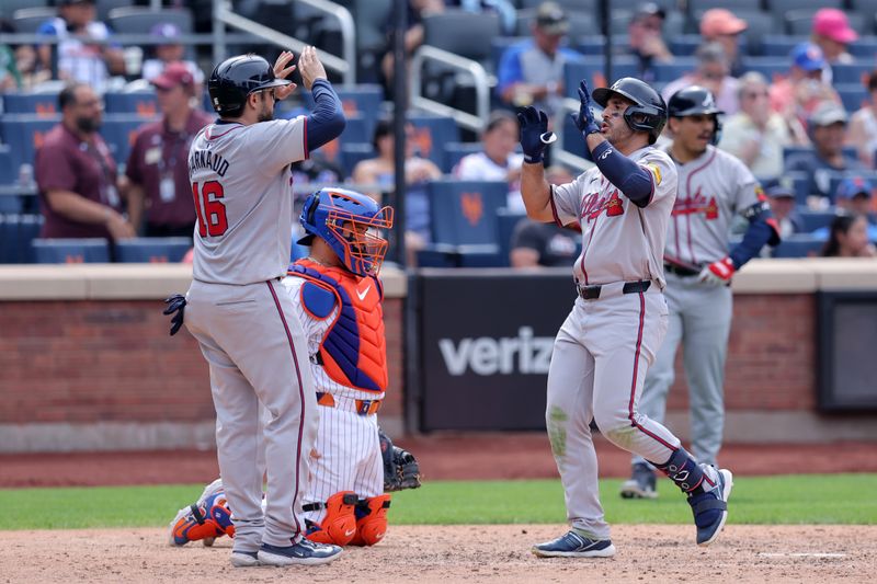 Jul 28, 2024; New York City, New York, USA; Atlanta Braves center fielder Ramon Laureano (18) celebrates with catcher Travis d'Arnaud (16) after hitting a two run home run against the New York Mets during the eighth inning at Citi Field. Mandatory Credit: Brad Penner-USA TODAY Sports