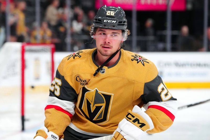 Oct 11, 2024; Las Vegas, Nevada, USA; Vegas Golden Knights right wing Alexander Holtz (26) warms up before a game against the St. Louis Blues at T-Mobile Arena. Mandatory Credit: Stephen R. Sylvanie-Imagn Images