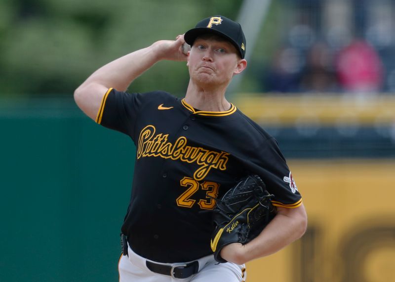 Apr 25, 2024; Pittsburgh, Pennsylvania, USA;  Pittsburgh Pirates starting pitcher Mitch Keller (23) delivers a pitch against the Milwaukee Brewers during the first inning at PNC Park. Mandatory Credit: Charles LeClaire-USA TODAY Sports