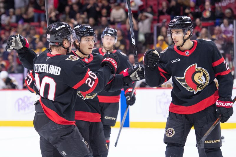 Nov 13, 2025; Ottawa, Ontario, CAN; Ottawa Senators center Dylan Cozens (24) celebrates with left wing Fabian Zetterlund (20) and defenseman Jordan Spence (10) after scoring in the first period against the Boston Bruins at the Canadian Tire Centre. Mandatory Credit: Marc DesRosiers-IMAGN Images