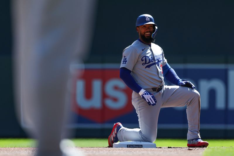 Apr 10, 2024; Minneapolis, Minnesota, USA; Los Angeles Dodgers Teoscar Hernandez (37) celebrates his RBI double against the Minnesota Twins during the first inning at Target Field. Mandatory Credit: Matt Krohn-USA TODAY Sports