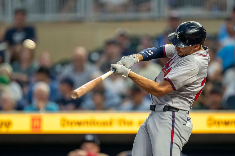 Aug 26, 2024; Minneapolis, Minnesota, USA; Atlanta Braves first baseman Matt Olson (28) hits a three run home run against the Minnesota Twins in the first inning at Target Field. Mandatory Credit: Jesse Johnson-USA TODAY Sports