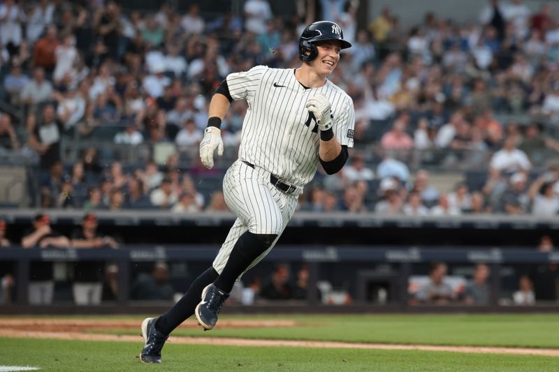 Jun 18, 2024; Bronx, New York, USA; New York Yankees first baseman Ben Rice (93) singles during the third inning against the Baltimore Orioles at Yankee Stadium. Mandatory Credit: Vincent Carchietta-USA TODAY Sports