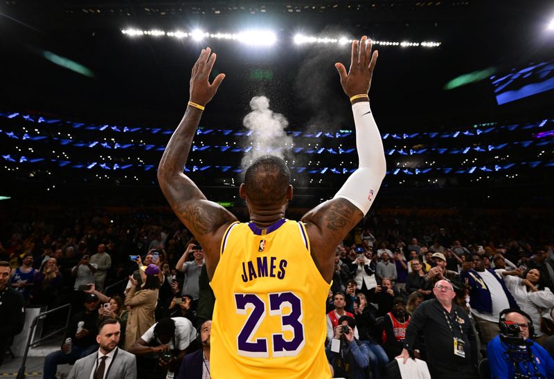 LOS ANGELES, CA - JANUARY 25: LeBron James #23 of the Los Angeles Lakers throws chalk before the game against the Chicago Bulls on January 25, 2024 at Crypto.Com Arena in Los Angeles, California. NOTE TO USER: User expressly acknowledges and agrees that, by downloading and/or using this Photograph, user is consenting to the terms and conditions of the Getty Images License Agreement. Mandatory Copyright Notice: Copyright 2024 NBAE (Photo by Adam Pantozzi/NBAE via Getty Images)