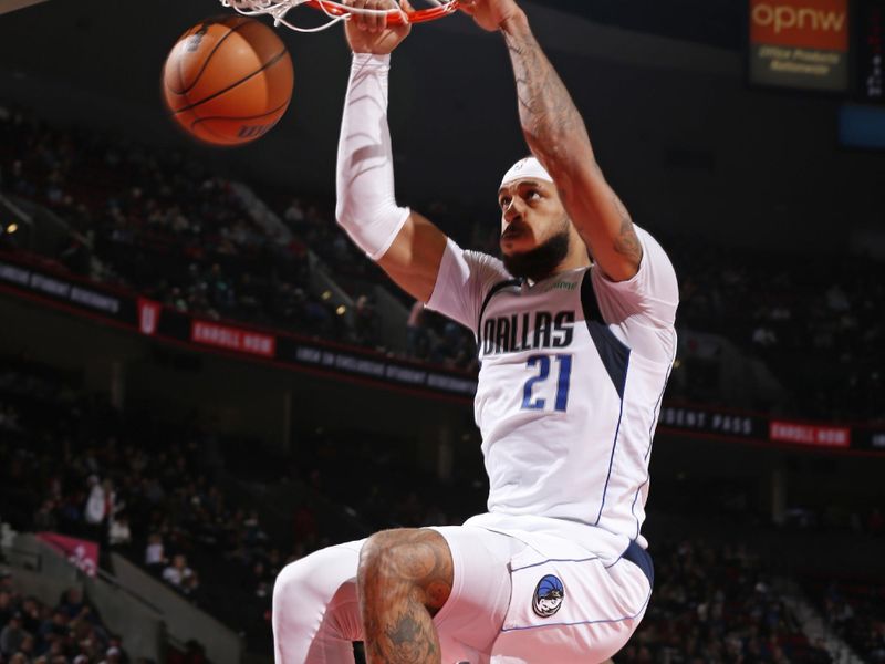 PORTLAND, OR - DECEMBER 1: Daniel Gafford #21 of the Dallas Mavericks dunks the ball during the game against the Portland Trail Blazers on December 1, 2024 at the Moda Center Arena in Portland, Oregon. NOTE TO USER: User expressly acknowledges and agrees that, by downloading and or using this photograph, user is consenting to the terms and conditions of the Getty Images License Agreement. Mandatory Copyright Notice: Copyright 2024 NBAE (Photo by Cameron Browne/NBAE via Getty Images)