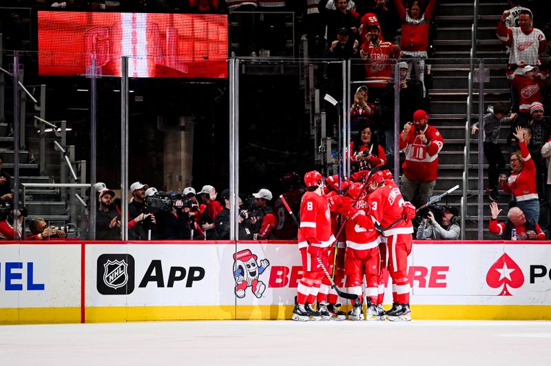 Apr 6, 2023; Detroit, Michigan, USA; Detroit Red Wings right wing Jonatan Berggren (52) celebrates his goal with teammates during the third period against the Buffalo Sabres at Little Caesars Arena. Mandatory Credit: Tim Fuller-USA TODAY Sports