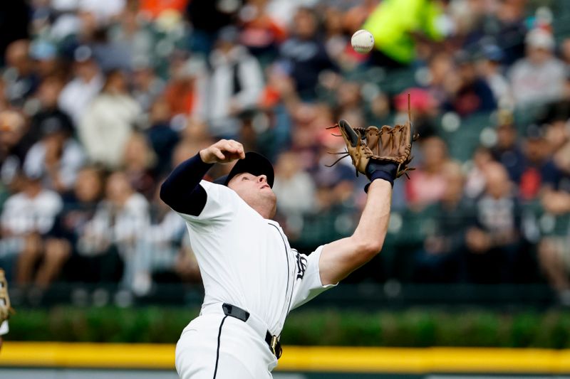 Sep 29, 2024; Detroit, Michigan, USA;  Detroit Tigers second baseman Colt Keith (33) makes a catch in the first inning against the Chicago White Sox at Comerica Park. Mandatory Credit: Rick Osentoski-Imagn Images