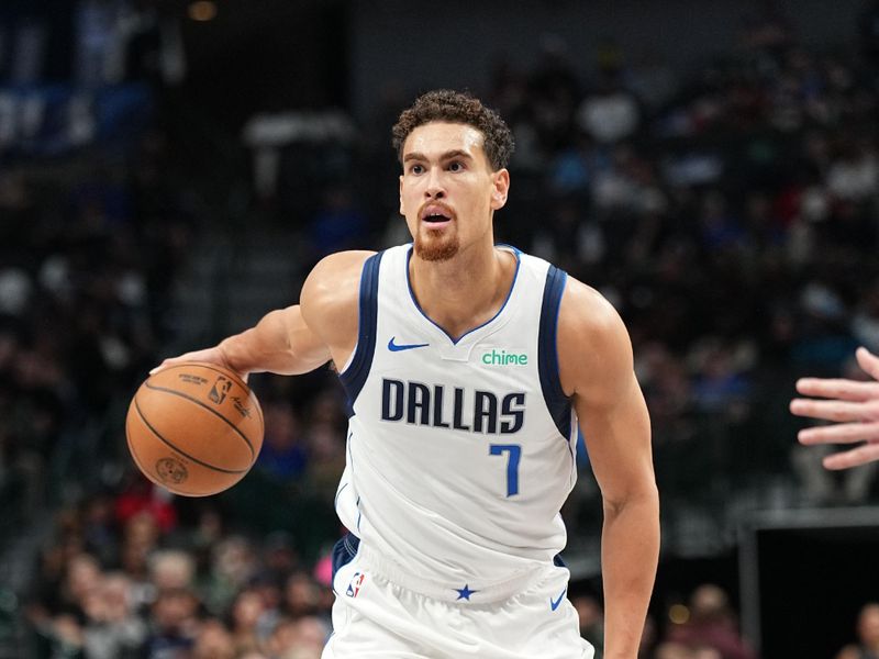 DALLAS, TX - OCTOBER 17: Dwight Powell #7 of the Dallas Mavericks dribbles the ball during the game against the Milwaukee Bucks during a NBA preseason game on October 17, 2024 at American Airlines Center in Dallas, Texas. NOTE TO USER: User expressly acknowledges and agrees that, by downloading and or using this photograph, User is consenting to the terms and conditions of the Getty Images License Agreement. Mandatory Copyright Notice: Copyright 2024 NBAE (Photo by Glenn James/NBAE via Getty Images)